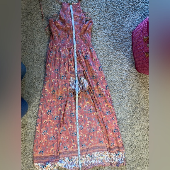 Floral Split front romper with attached shorts and smock halter top. - Picture 9 of 13